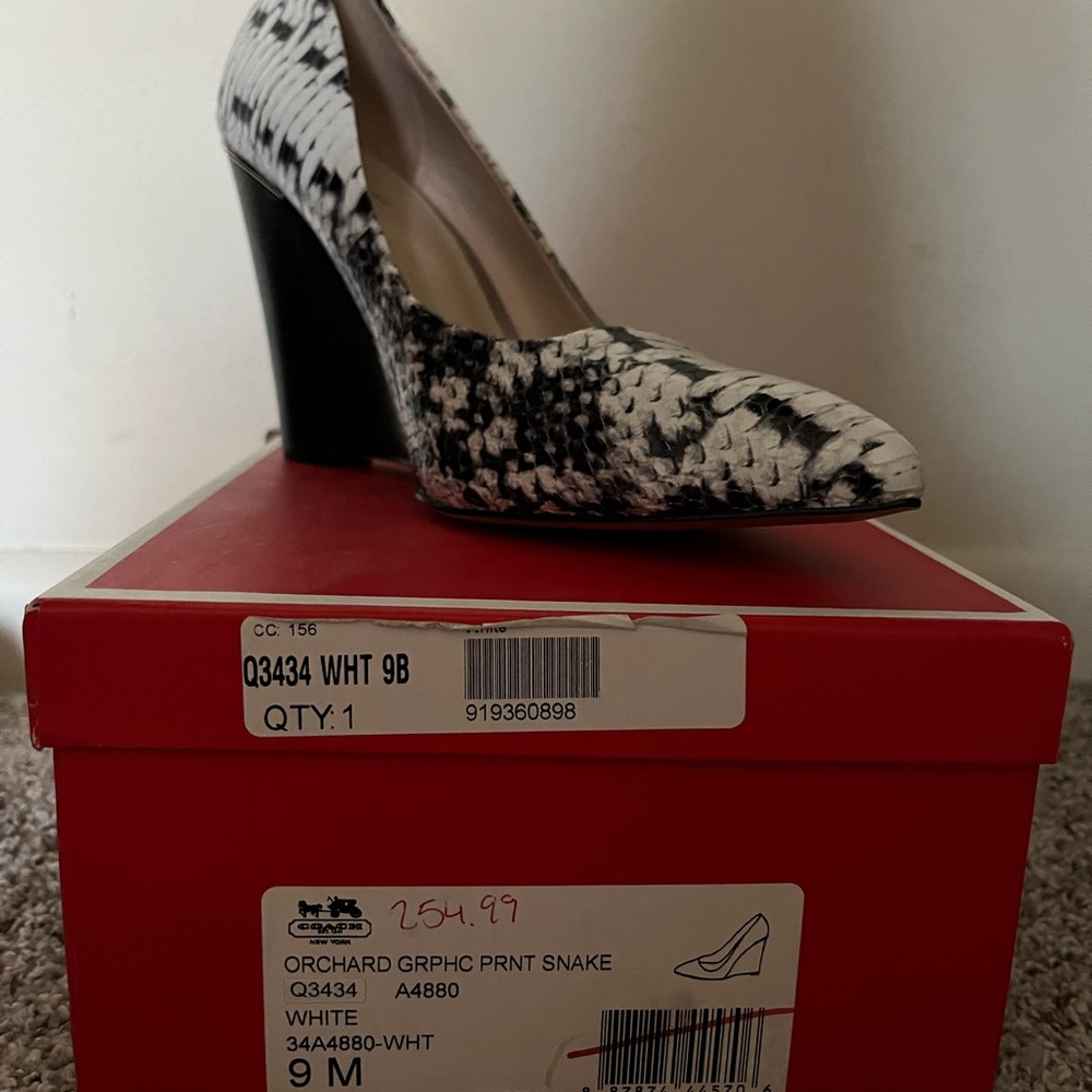 Coach wedge ... never worn.